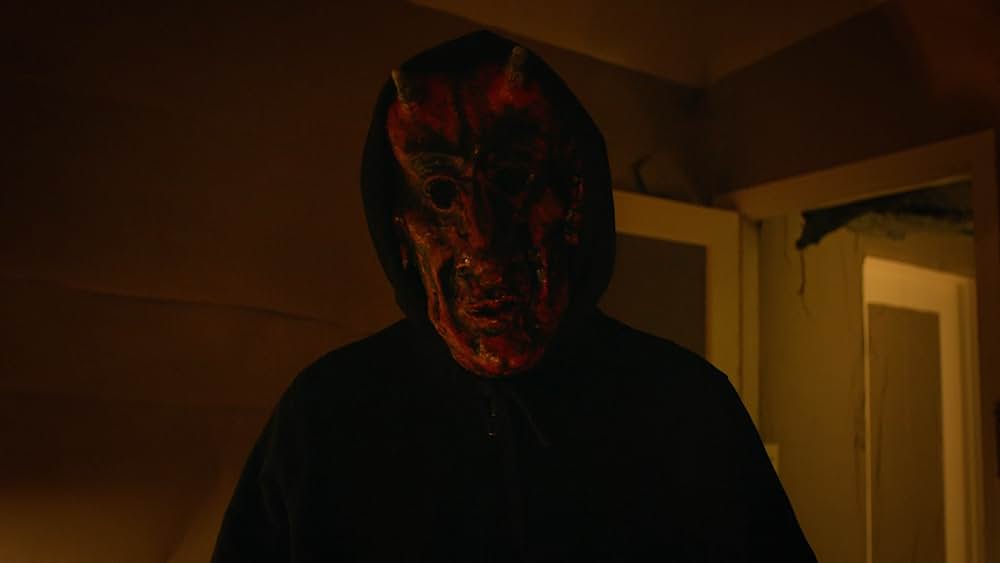 デルージョン 画面の向こうの女に憑りつかれた男の画像