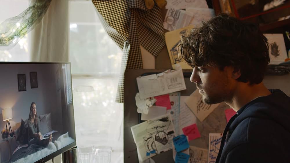 デルージョン 画面の向こうの女に憑りつかれた男の画像