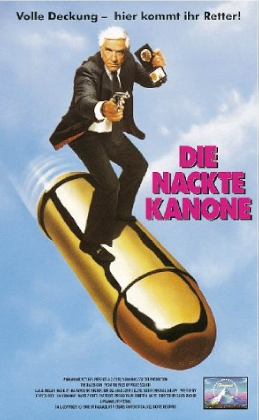 裸の銃を持つ男の画像