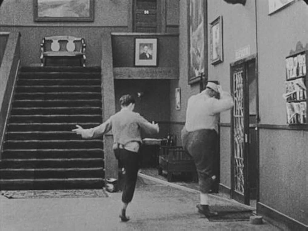 デブ君の給仕の画像