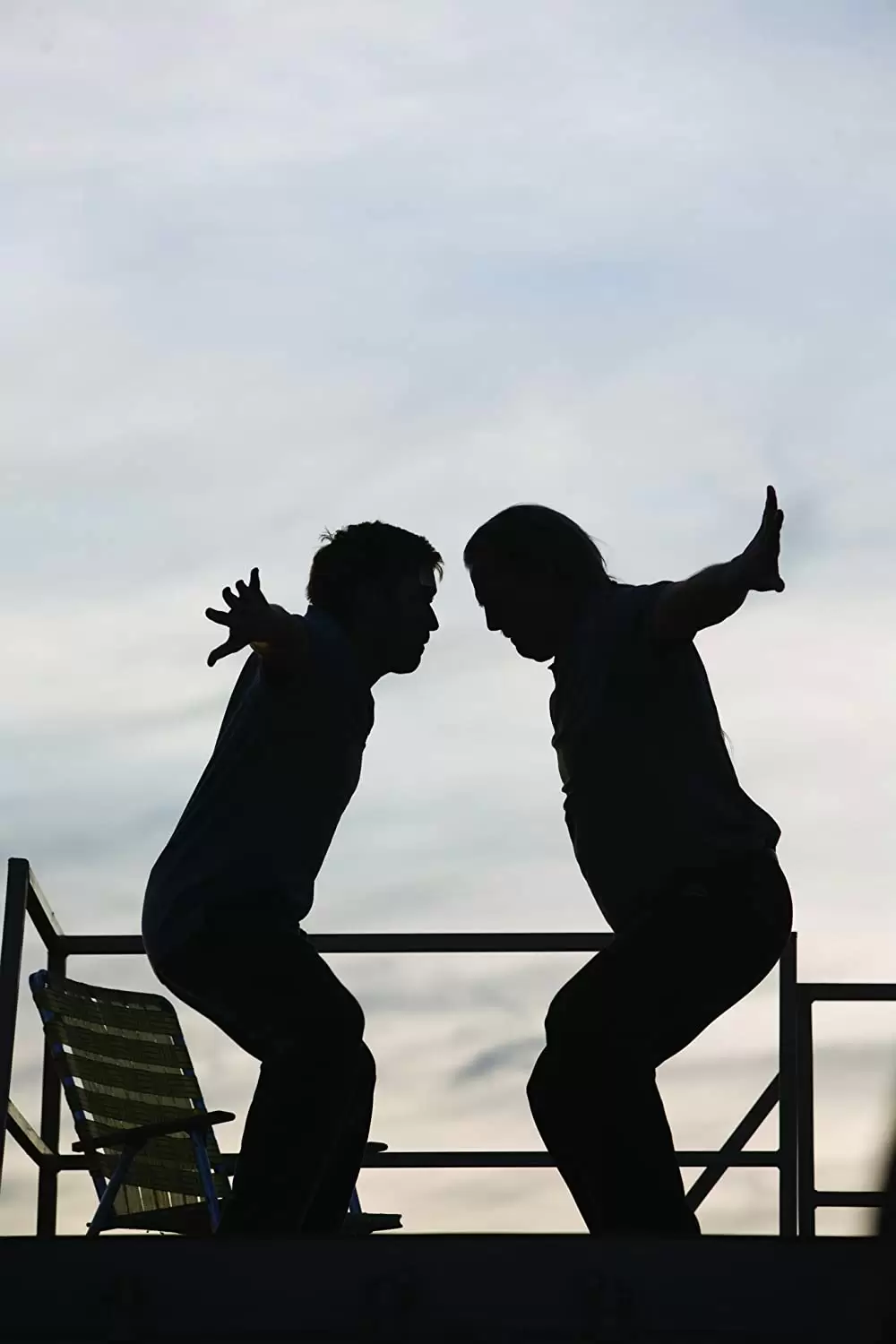 ヤギと男と男と壁との画像