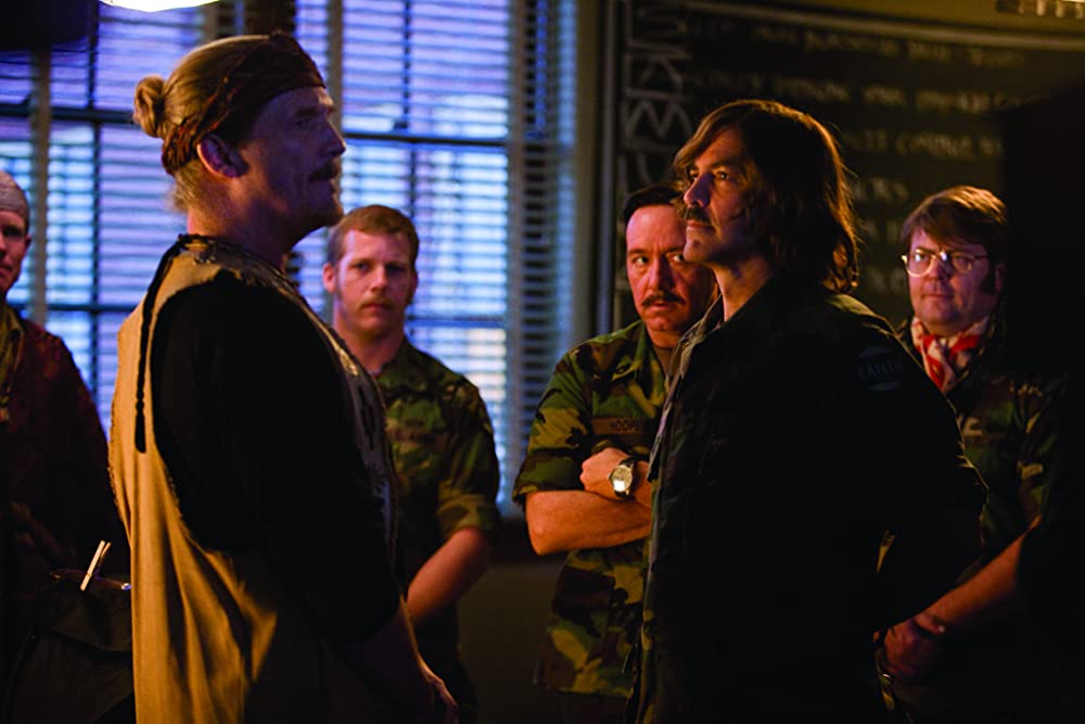 ヤギと男と男と壁との画像