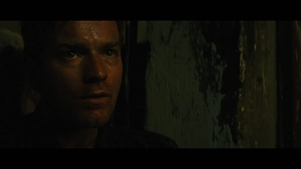 ヤギと男と男と壁との画像