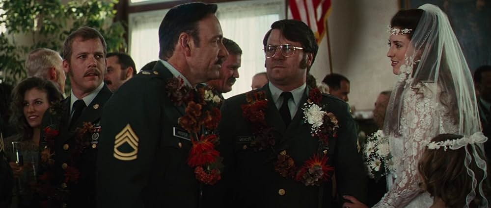 ヤギと男と男と壁との画像