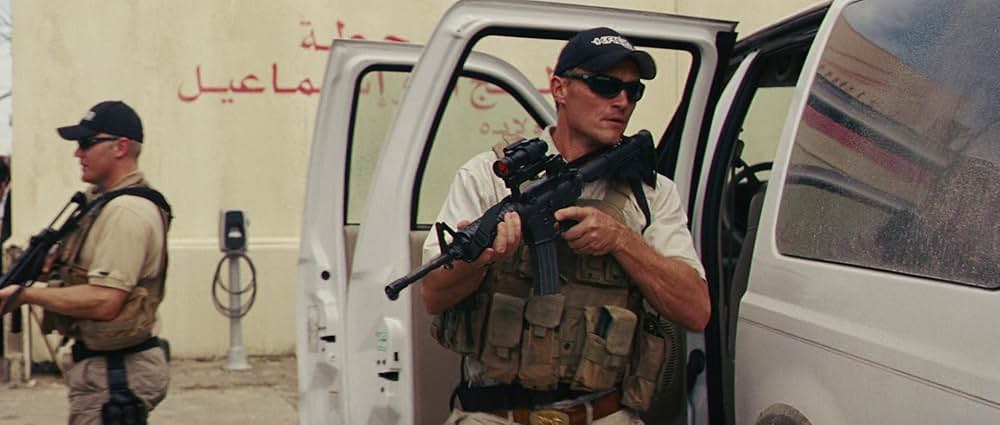 ヤギと男と男と壁との画像