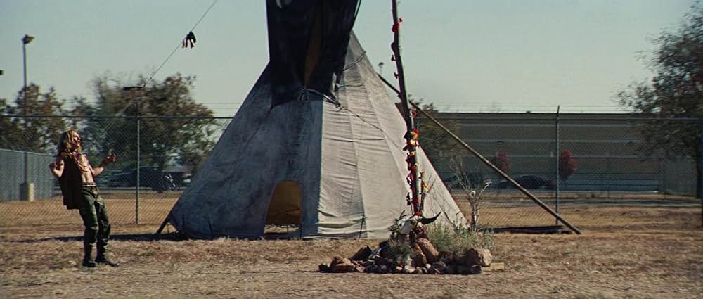 ヤギと男と男と壁との画像