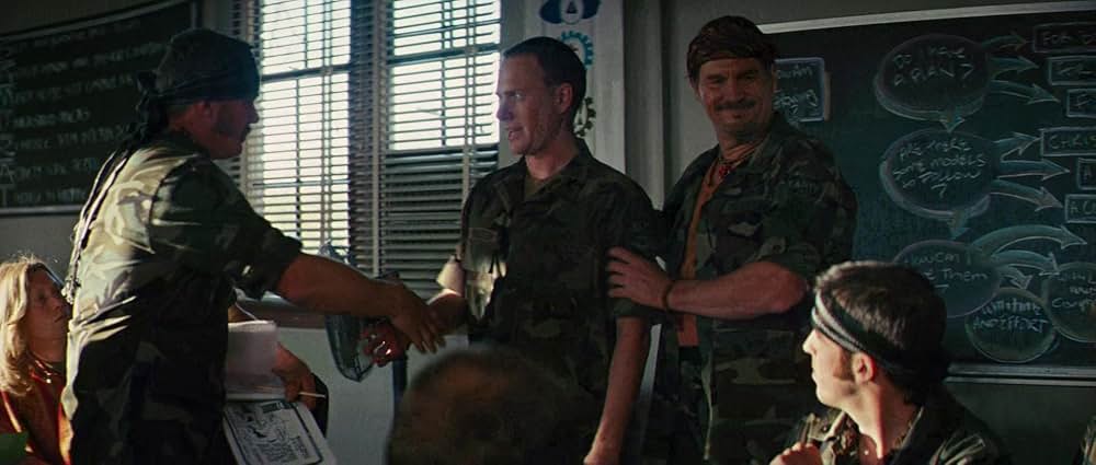 ヤギと男と男と壁との画像