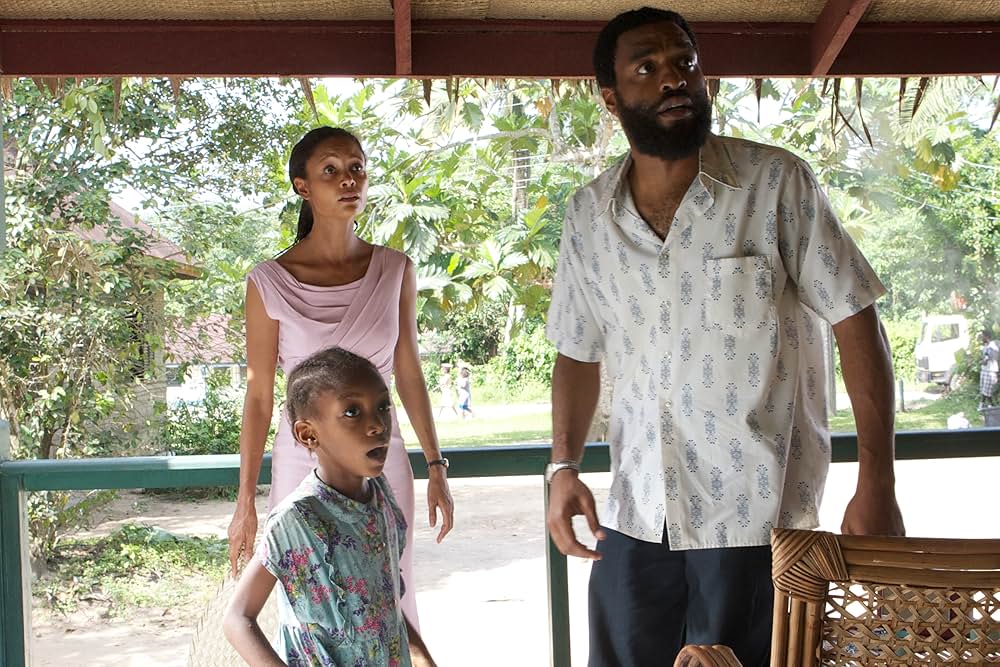 半分のぼった黄色い太陽の画像