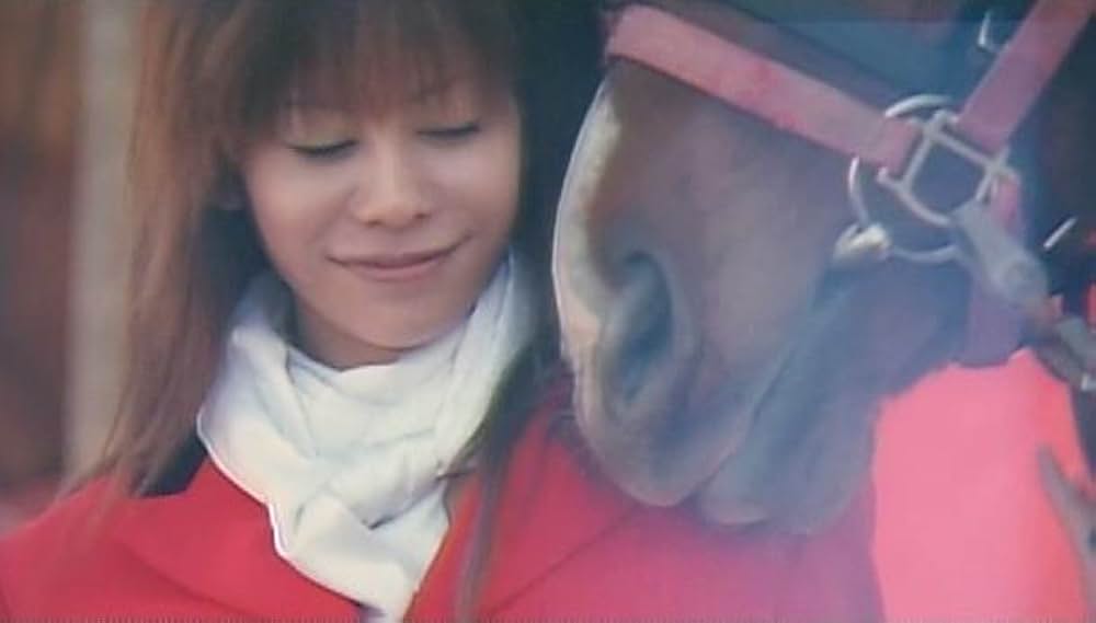 馬と後妻と令嬢の写真