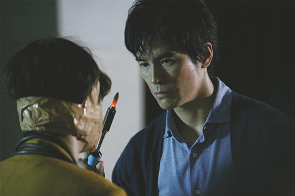 悪の教典の画像