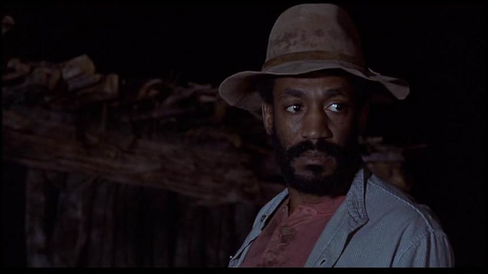 盗賊と馬と拳銃との画像