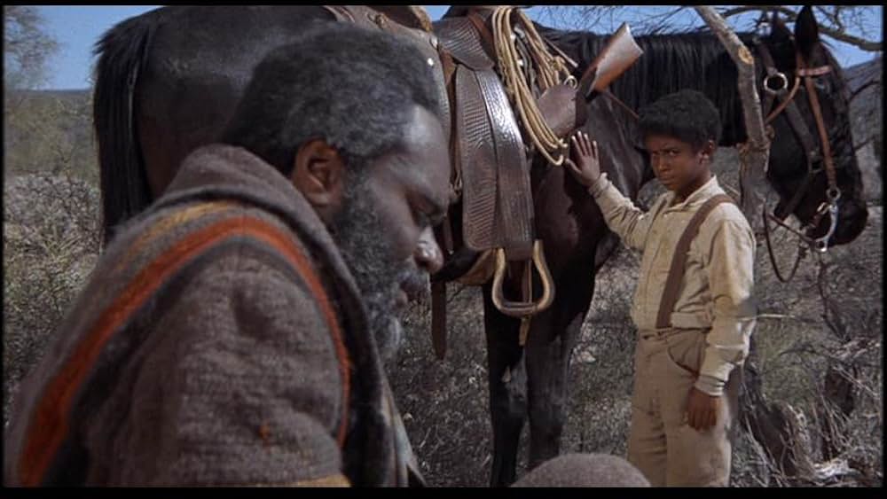 盗賊と馬と拳銃との画像