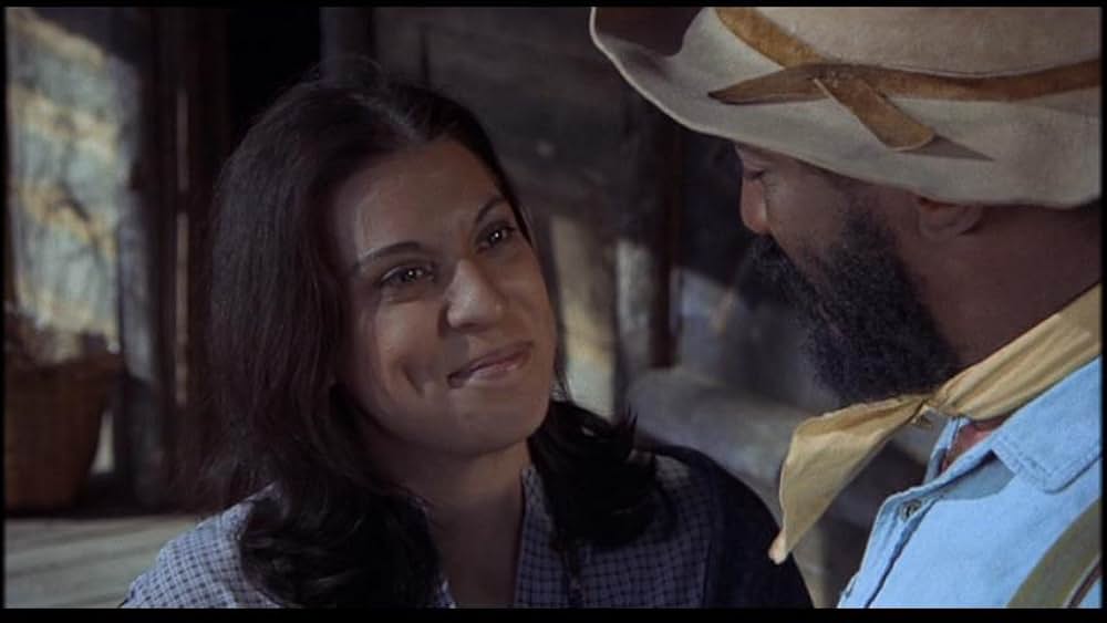 盗賊と馬と拳銃との画像