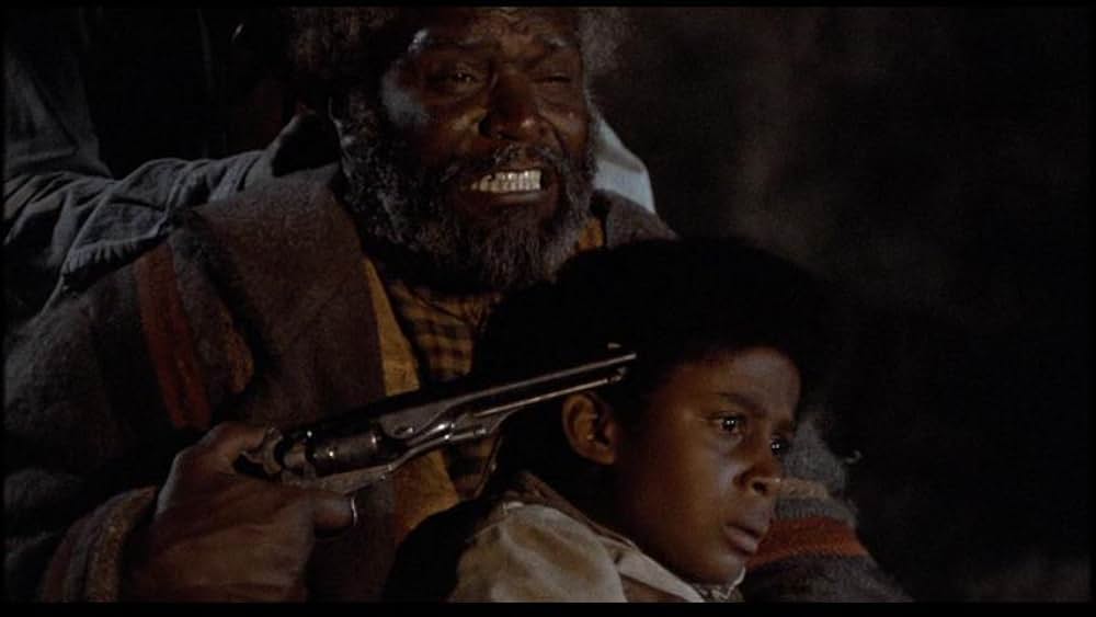 盗賊と馬と拳銃との画像