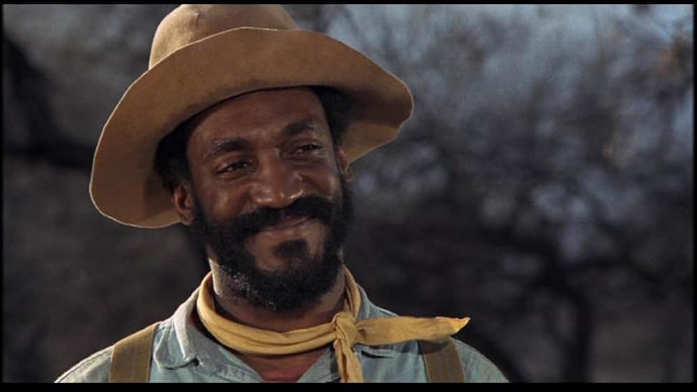 盗賊と馬と拳銃との画像