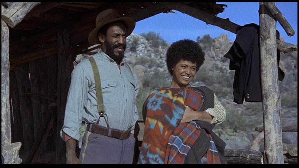 盗賊と馬と拳銃との画像