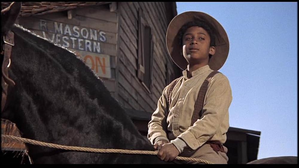 盗賊と馬と拳銃との画像