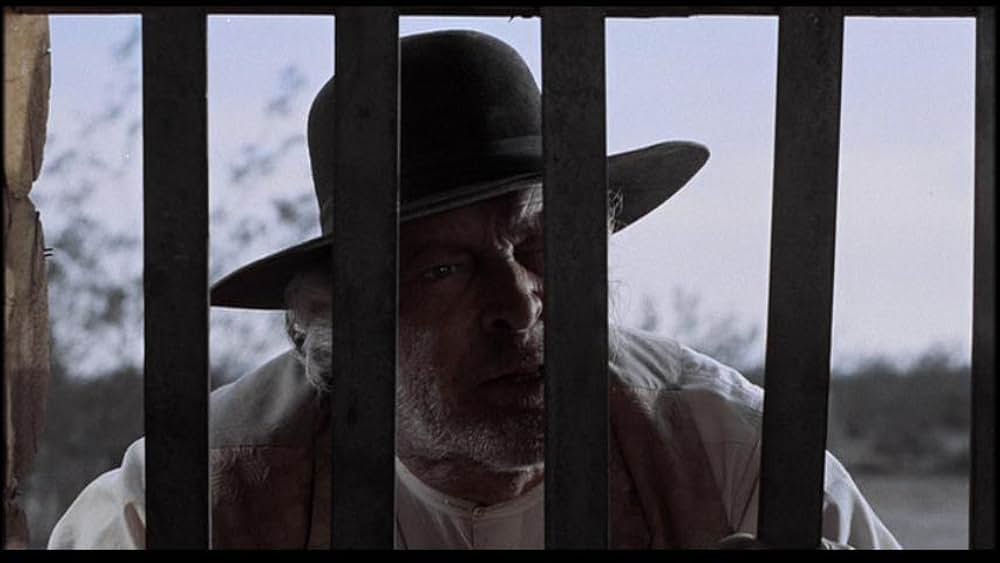 盗賊と馬と拳銃との画像