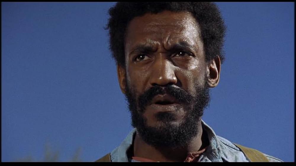 盗賊と馬と拳銃との画像