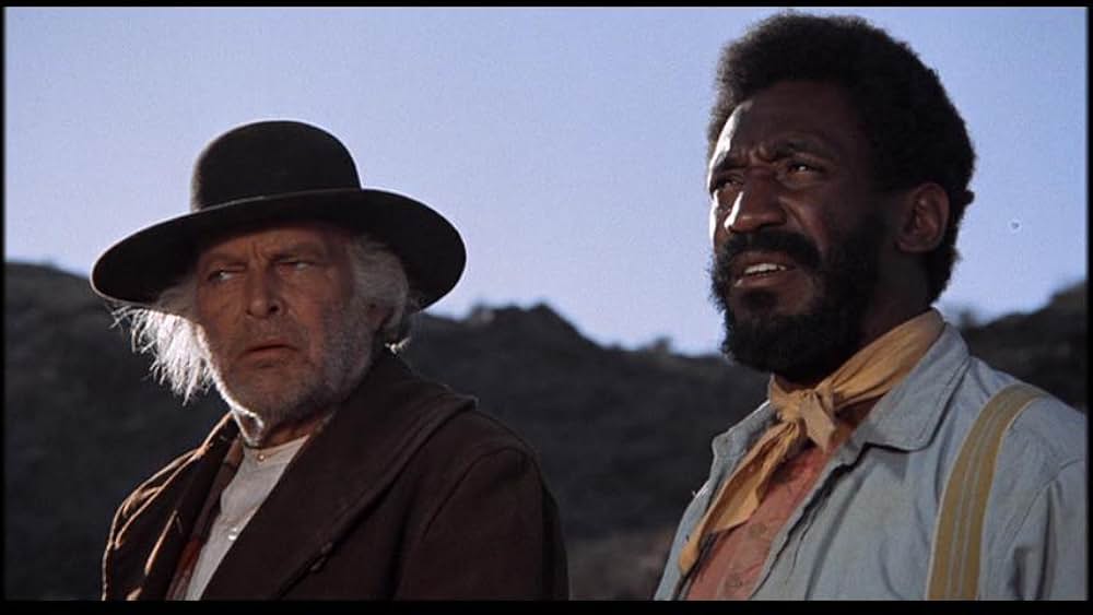 盗賊と馬と拳銃との画像