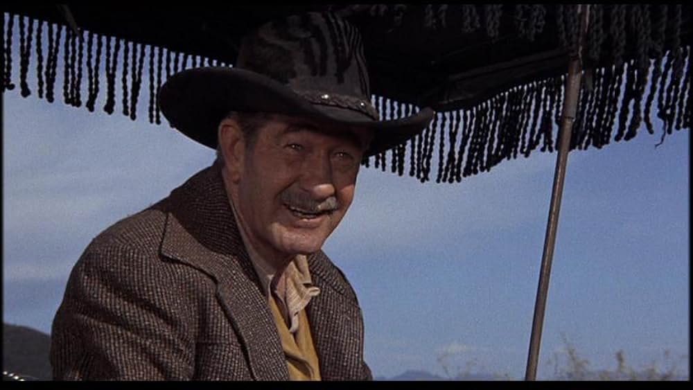 盗賊と馬と拳銃との画像