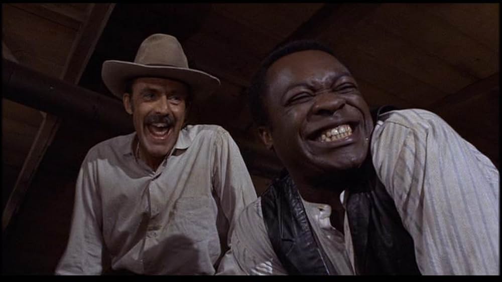 盗賊と馬と拳銃との画像