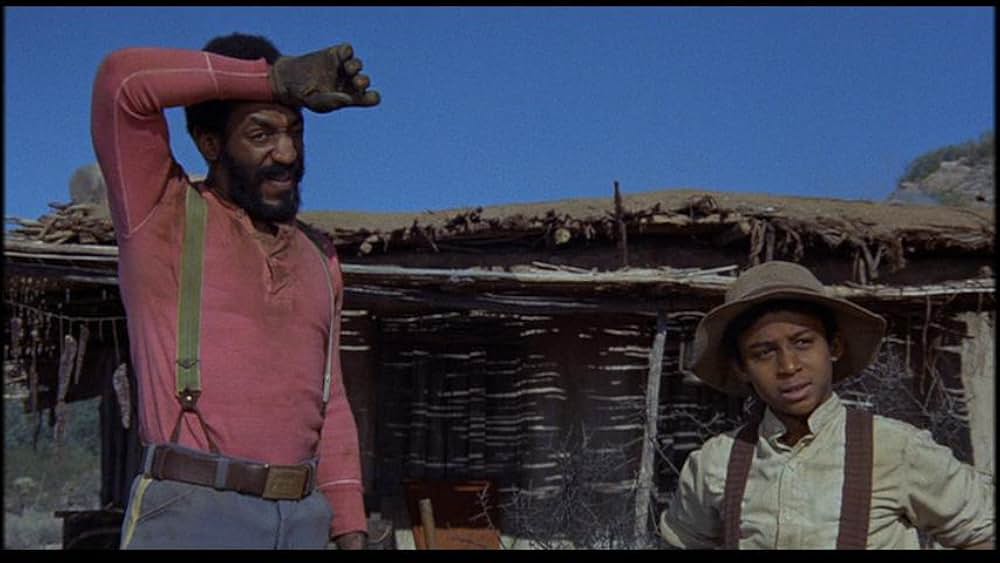 盗賊と馬と拳銃との画像