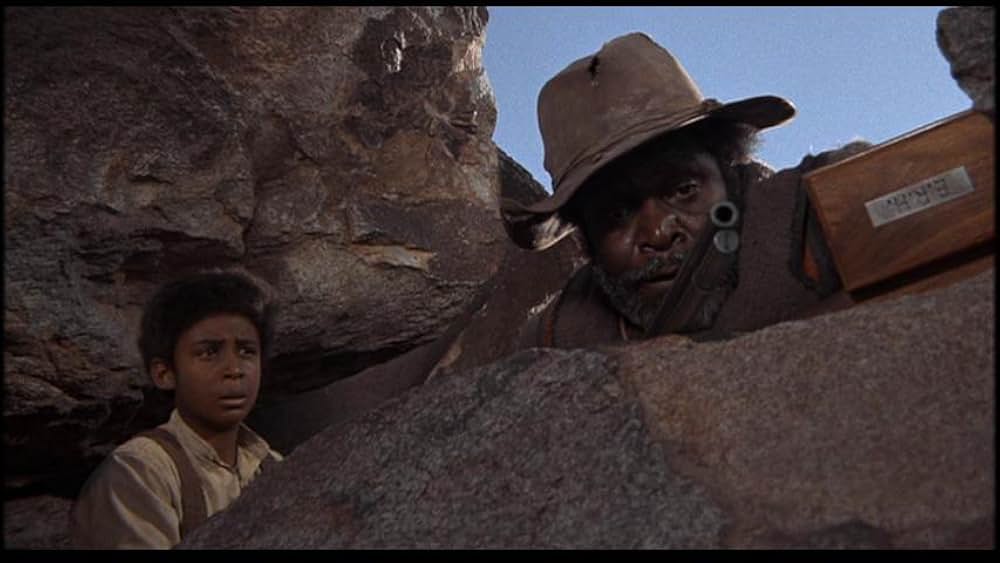 盗賊と馬と拳銃との画像