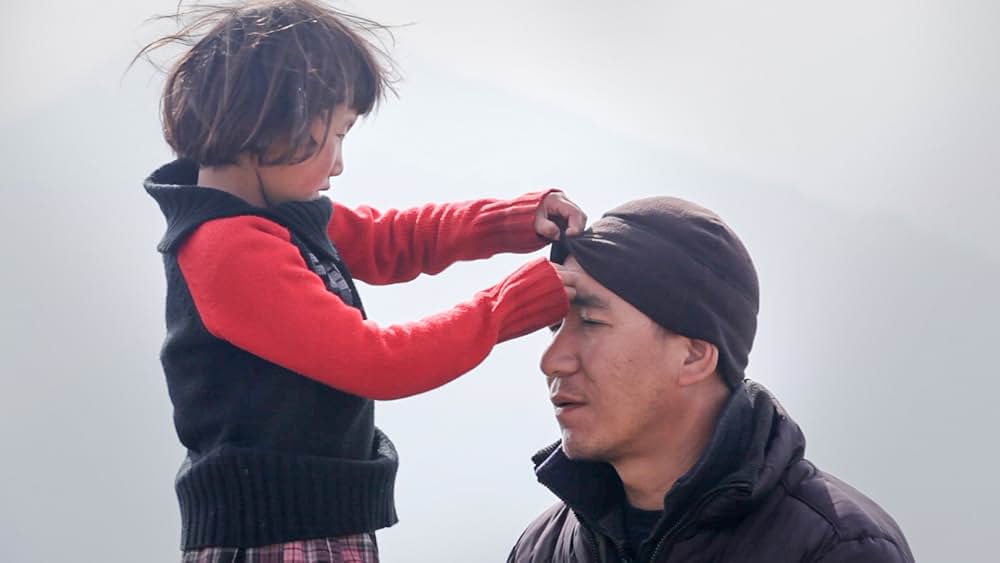 タシちゃんと僧侶の画像