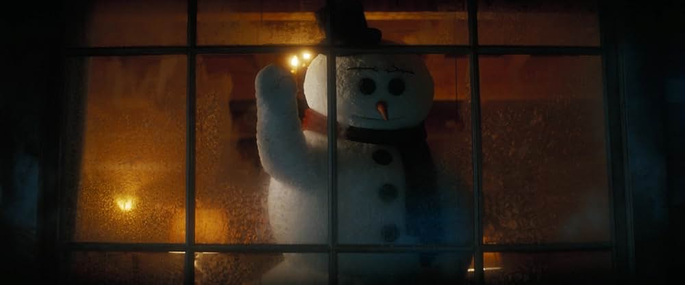 裸の銃を持つ男の画像