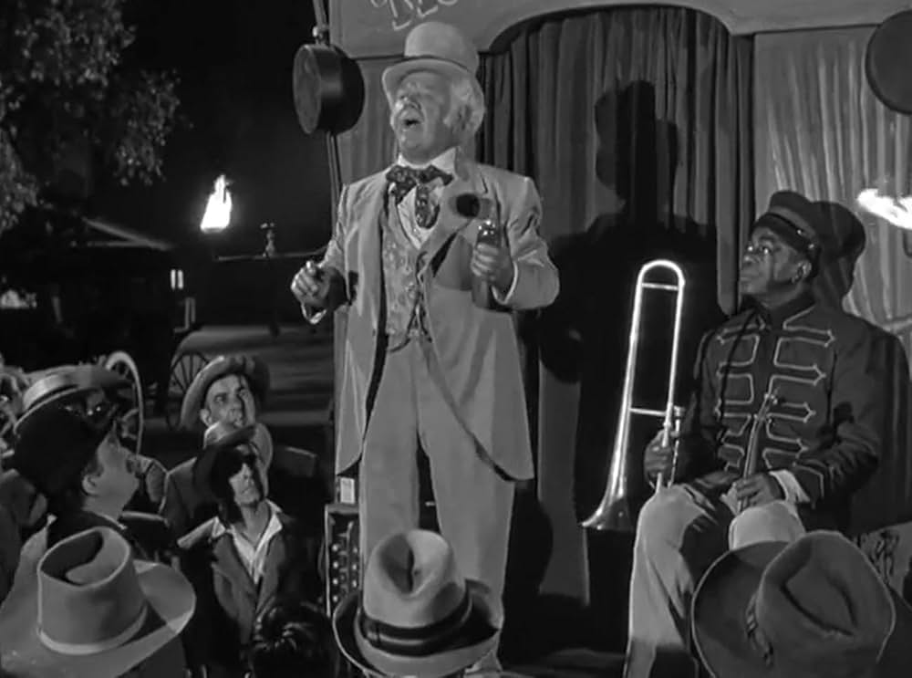 おじさんと孤児の画像