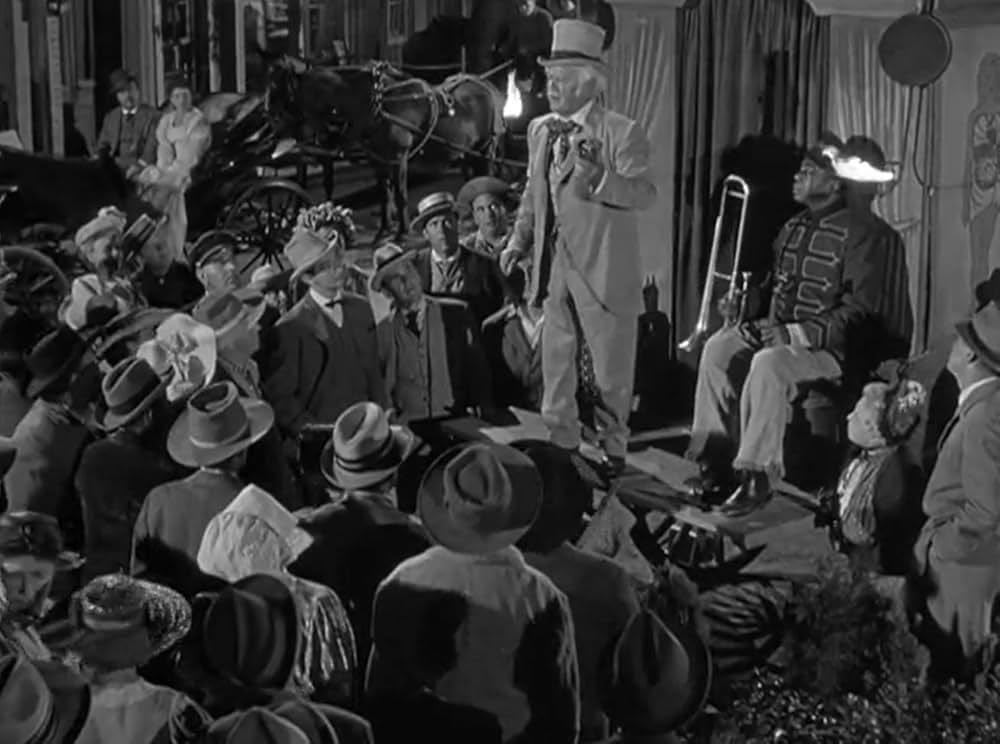 おじさんと孤児の画像