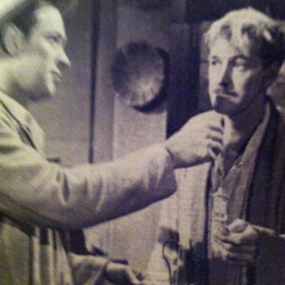 おじさんと孤児の画像