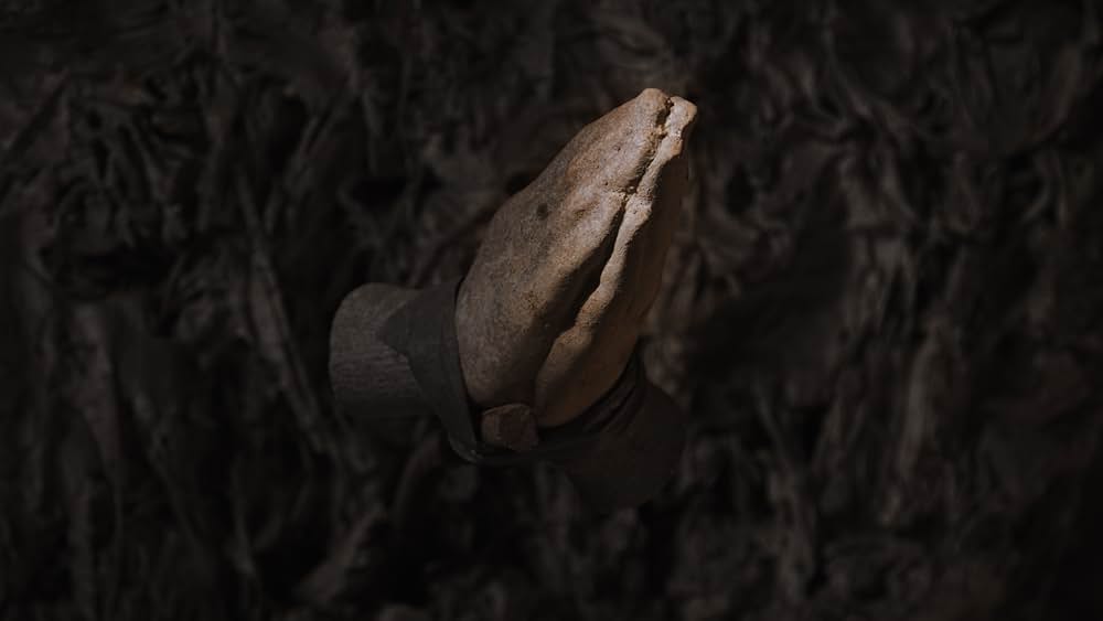 戦禍の彫塑工房の画像