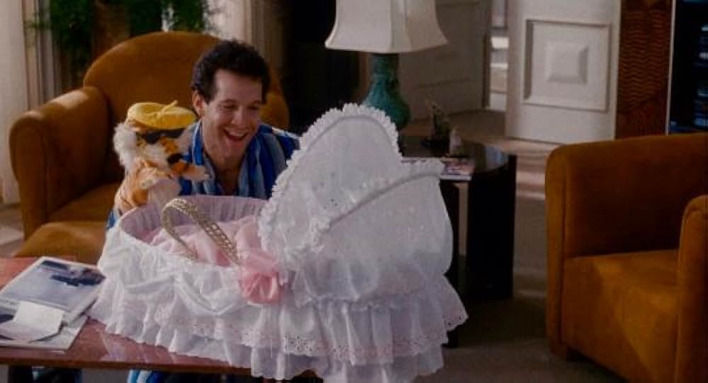 スリーメン&ベビーの画像