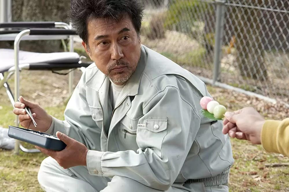 キツツキと雨の画像