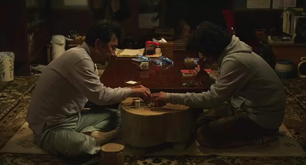 キツツキと雨の画像