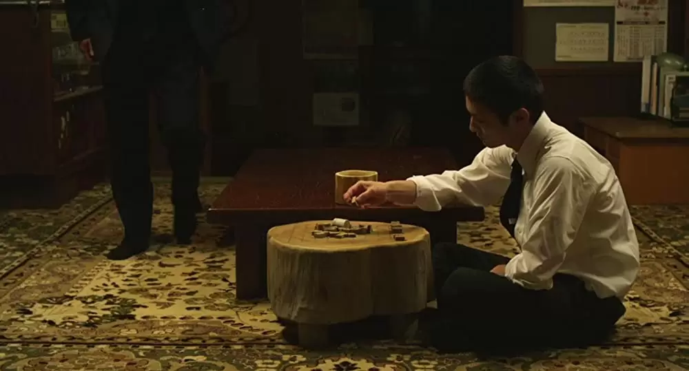 キツツキと雨の画像