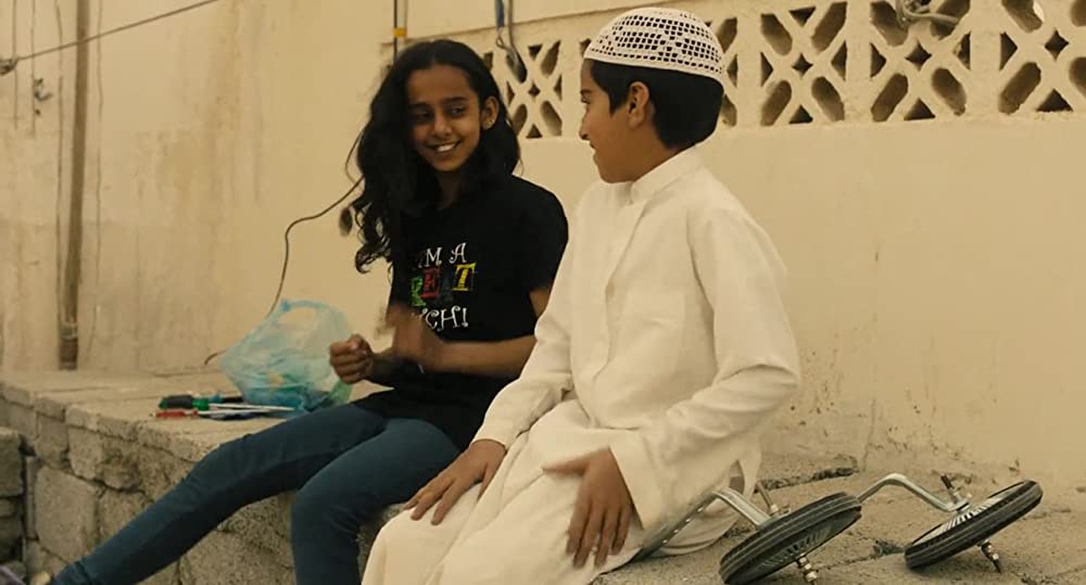 少女は自転車にのっての画像