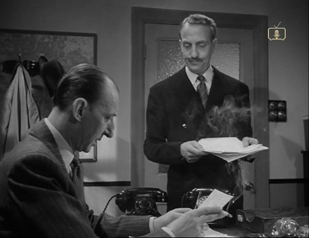 無言の目撃者の画像