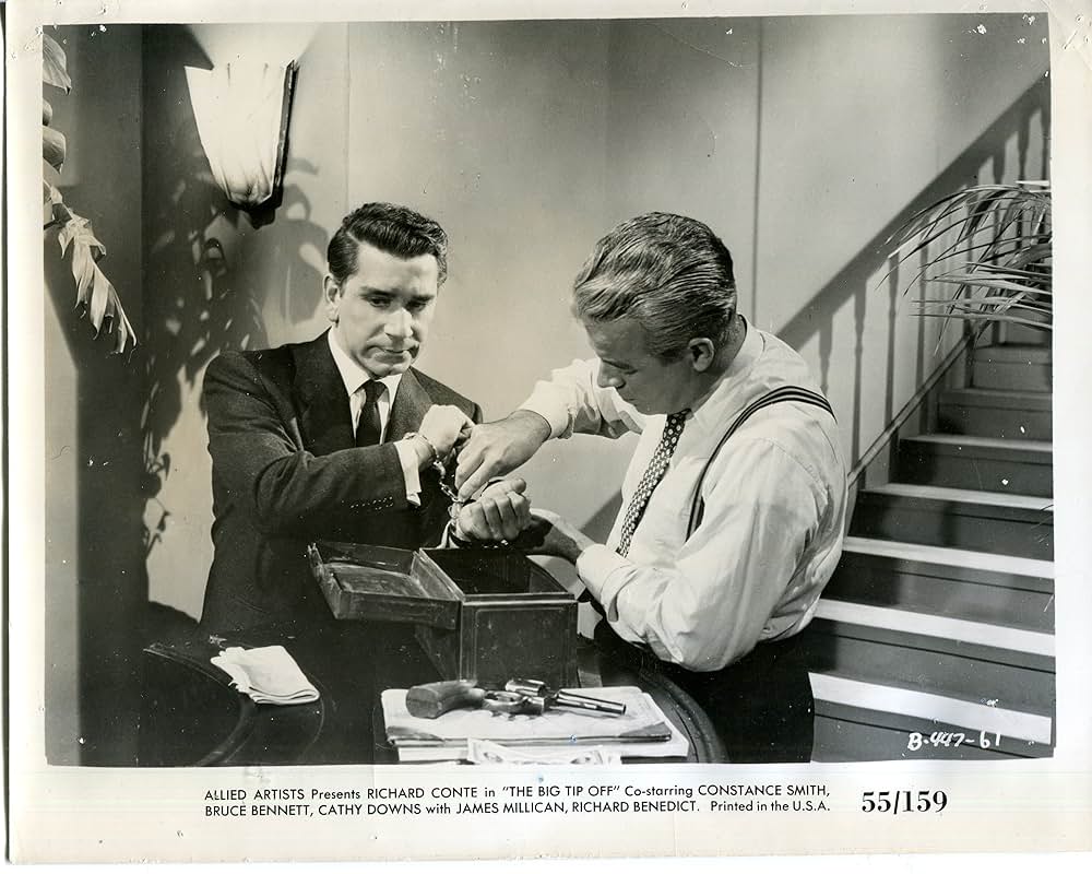 暗黒街の記者の写真