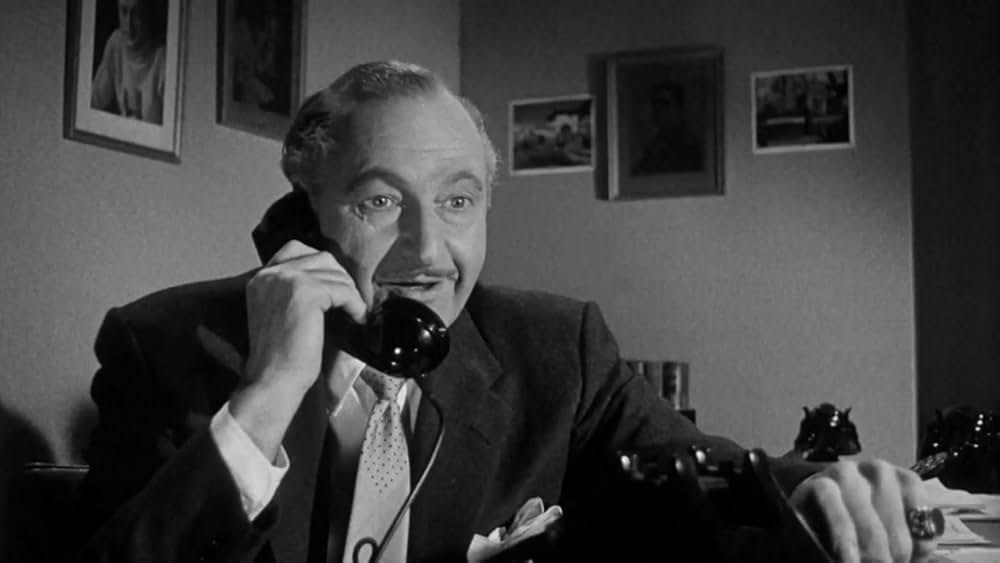 Death of a Scoundrel（原題）の画像