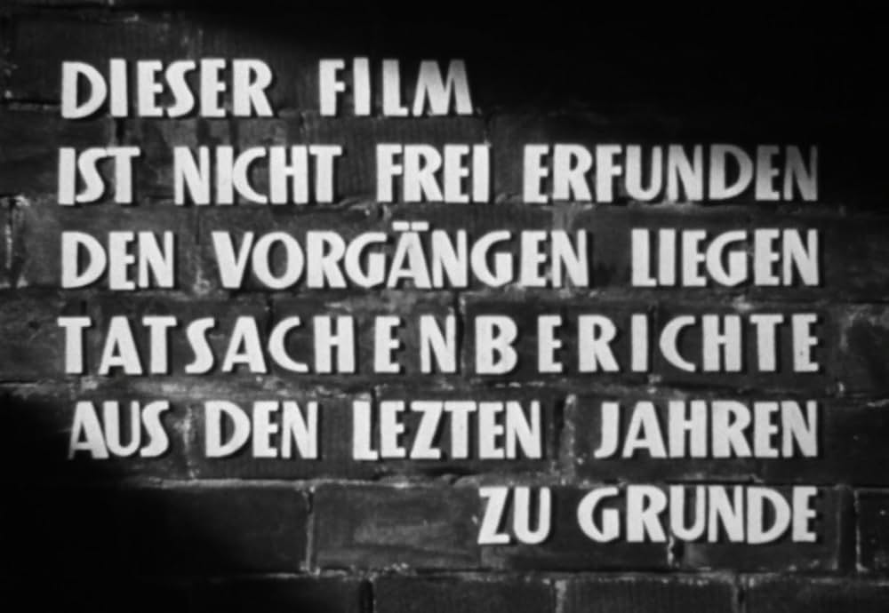 追い詰められた男の画像