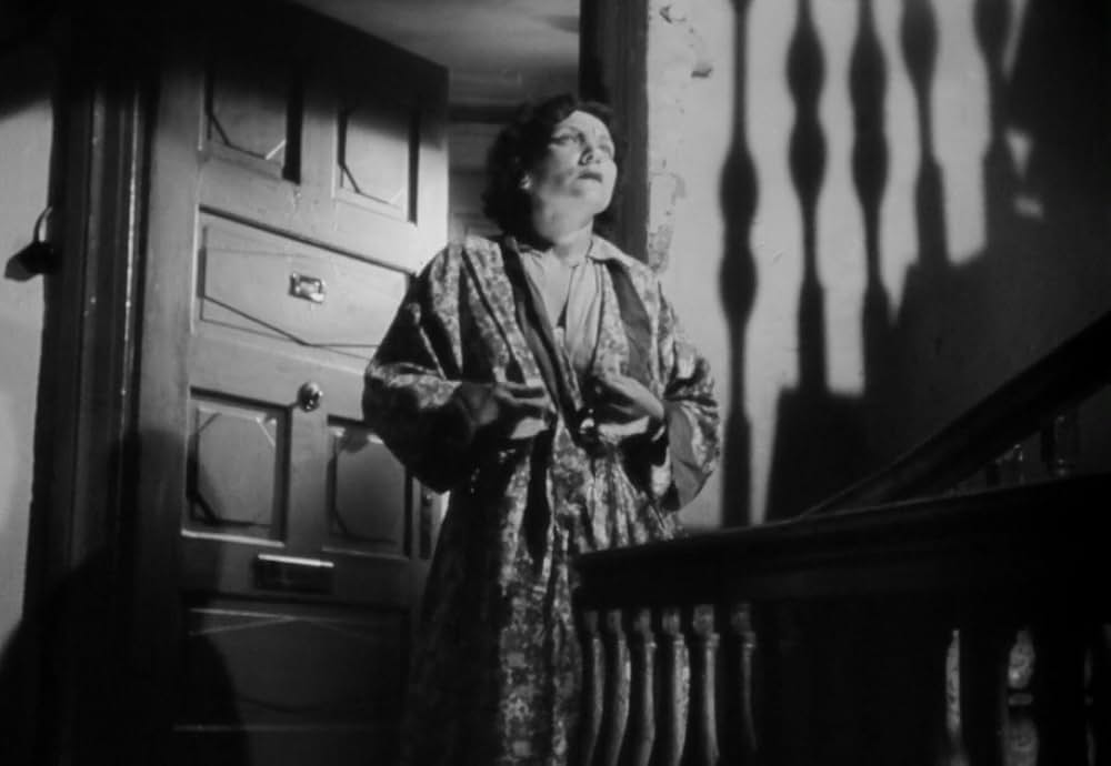 追い詰められた男の画像