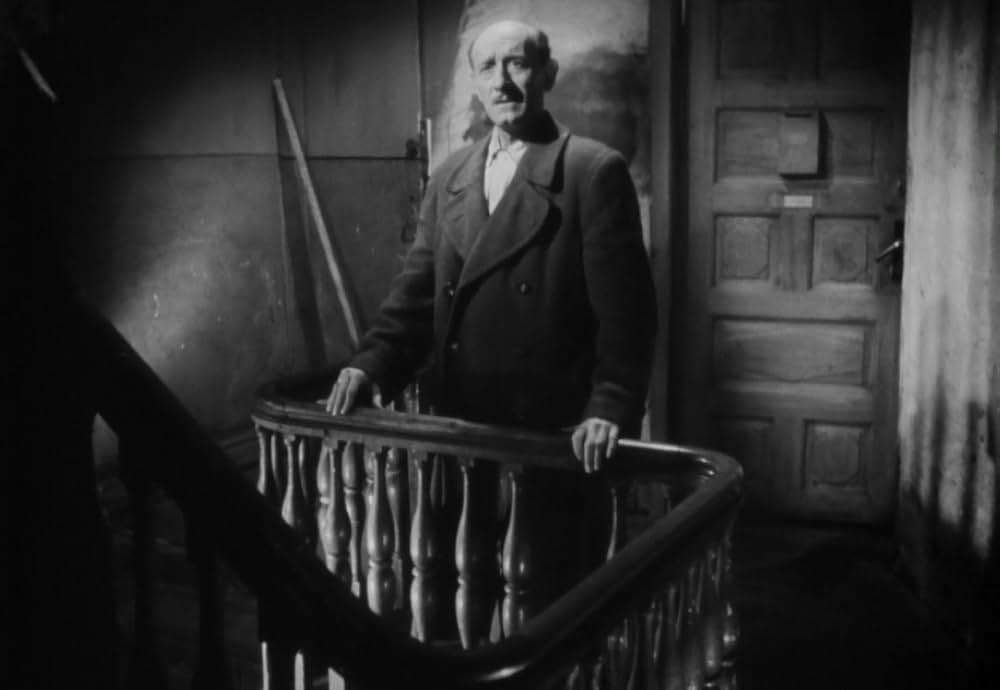 追い詰められた男の画像