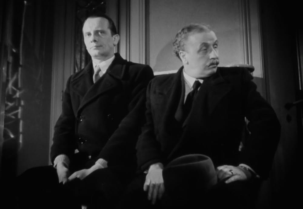 追い詰められた男の画像