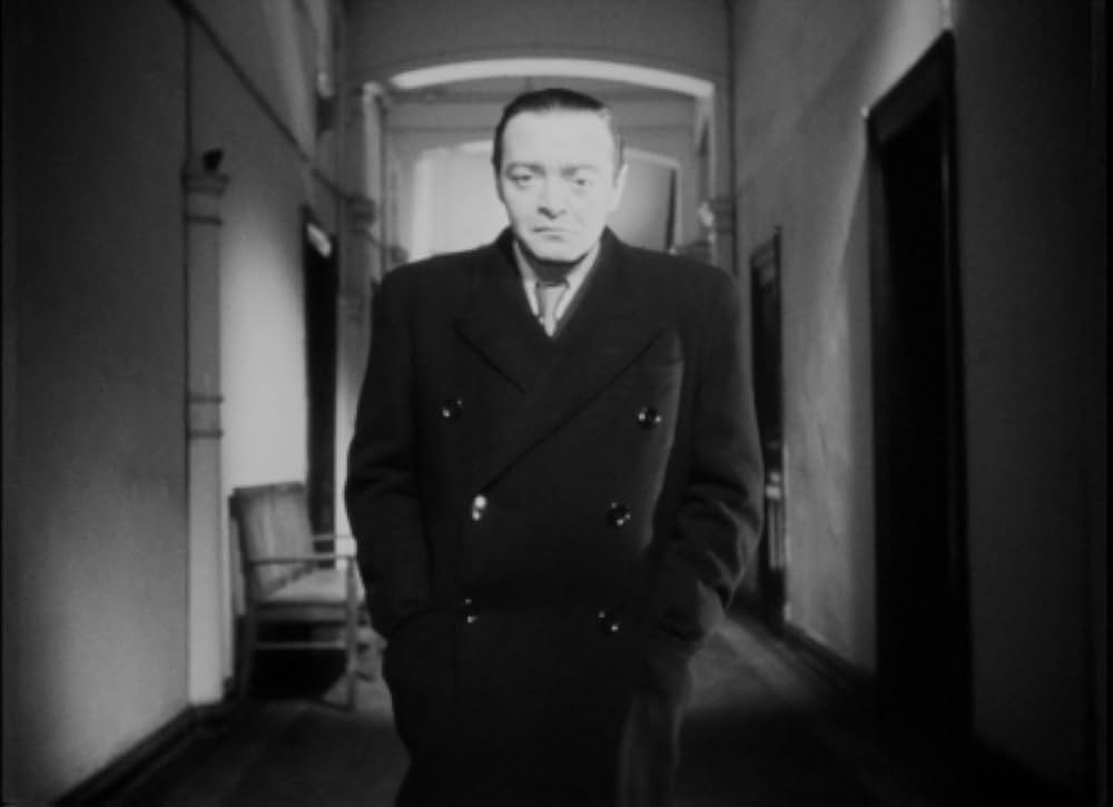 追い詰められた男の画像