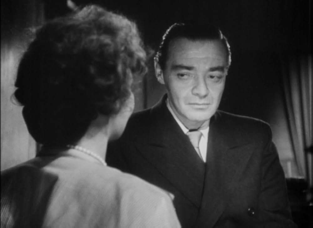 追い詰められた男の画像