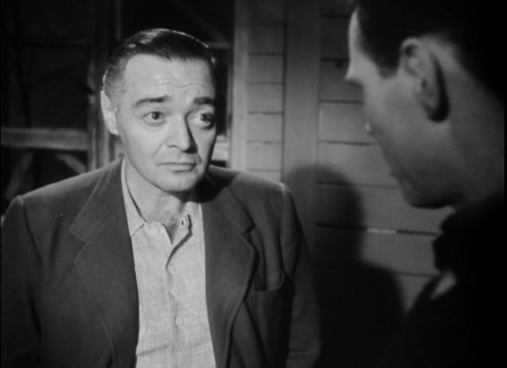 追い詰められた男の画像