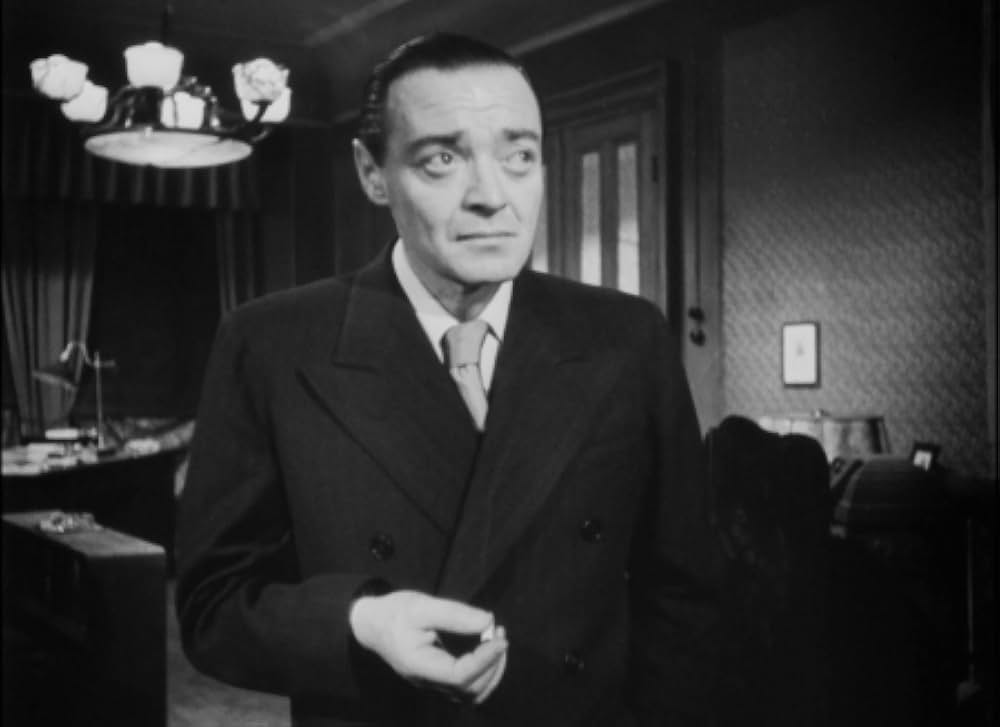 追い詰められた男の画像